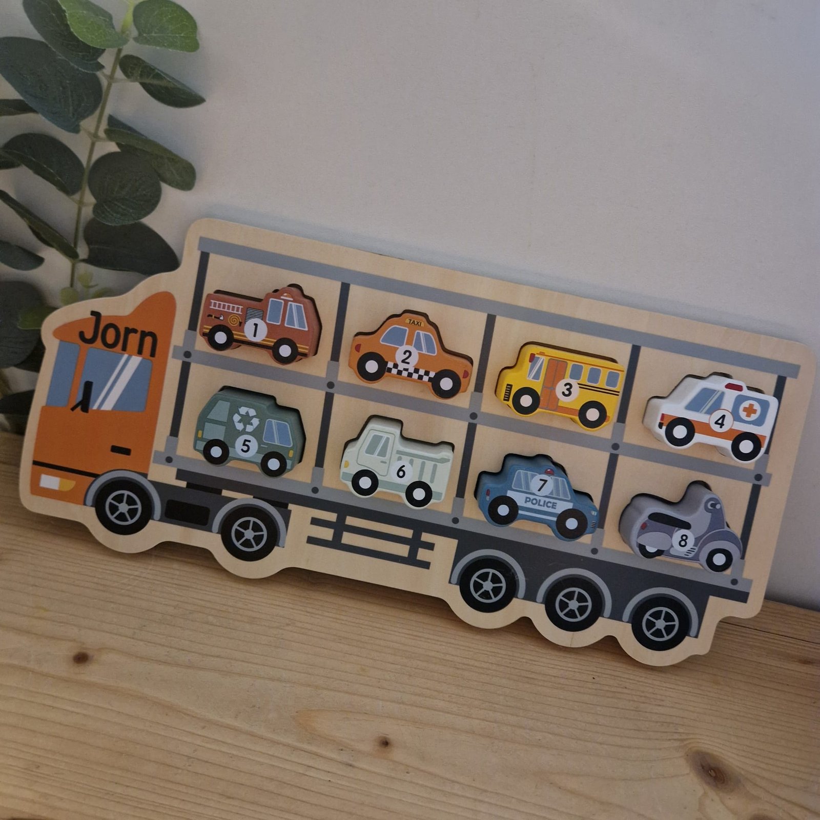 Puzzel vrachtwagen met auto's met naam